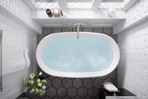 Aerial view of a remodeled bathroom with freestanding tub and tile floor in the Inland Empire