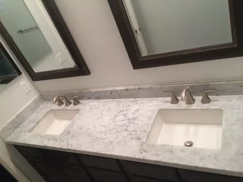Double vanity with marble countertop installed in Chino bathroom