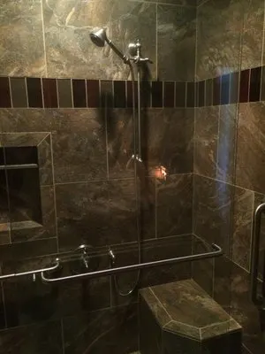 Espresso floor-to-ceiling tile installation in Chino area home