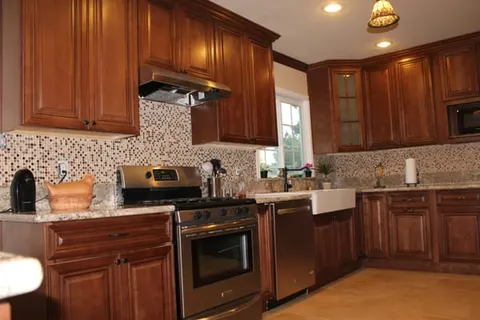 Traditional cherry wood kitchen cabinets
