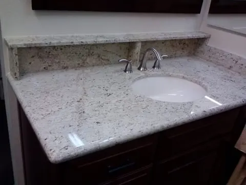 White quartz countertop with undermount sink